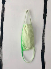green cotton mask made from dying with flowers