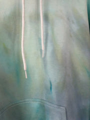 close up of a natural fabric dyed hoodie 